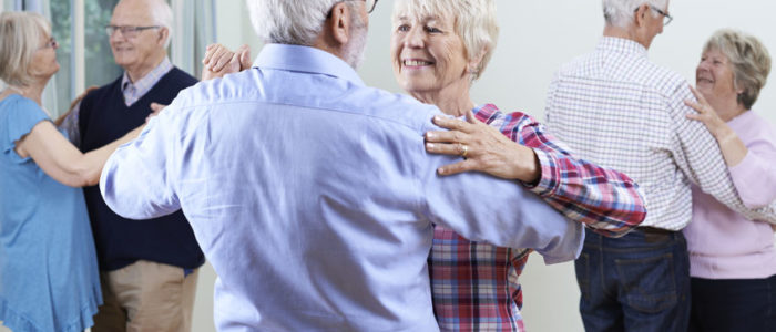 Group of seniors enjoying dancing together